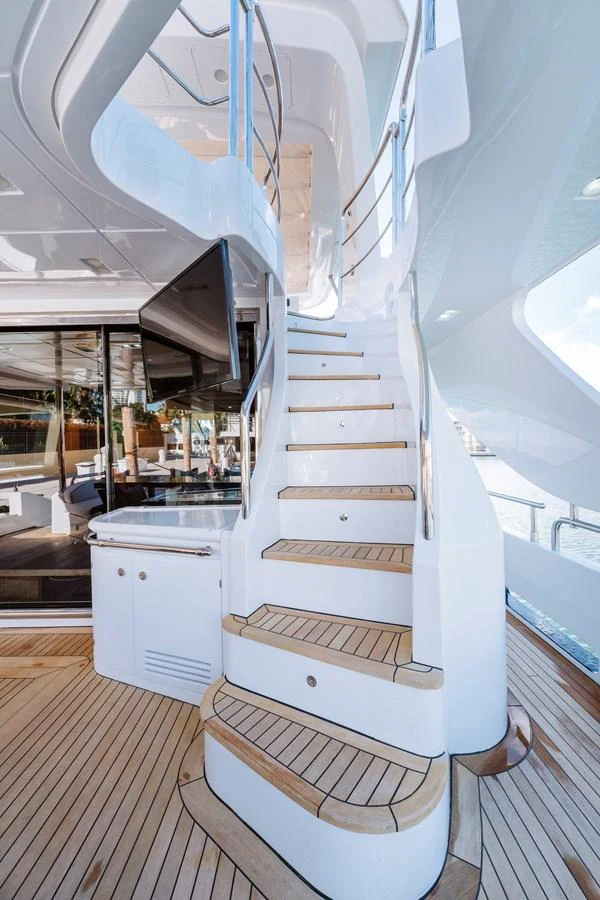 a white boat in a room aboard RESET Yacht for Sale