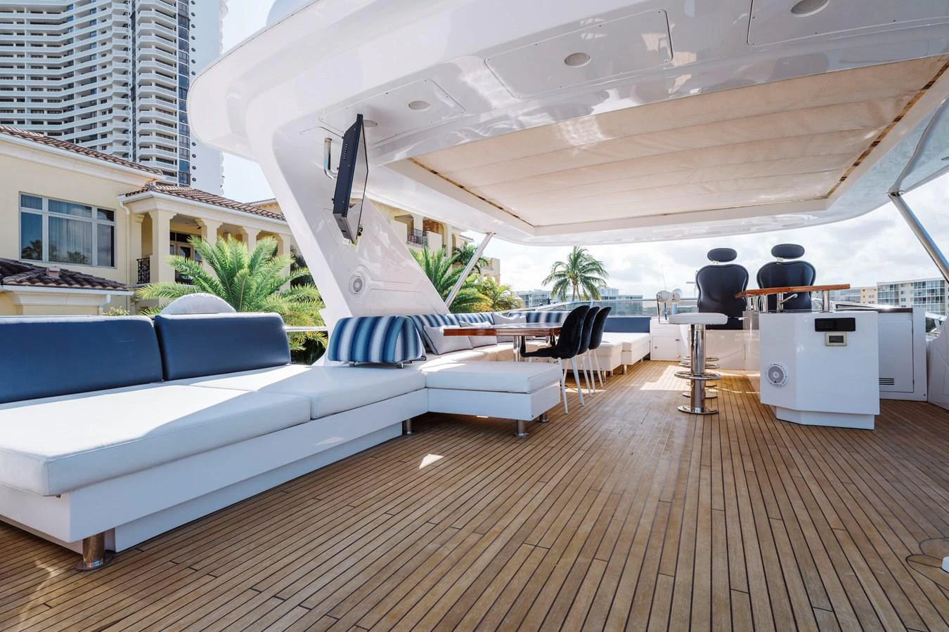 a large room with a couch and a table aboard RESET Yacht for Sale