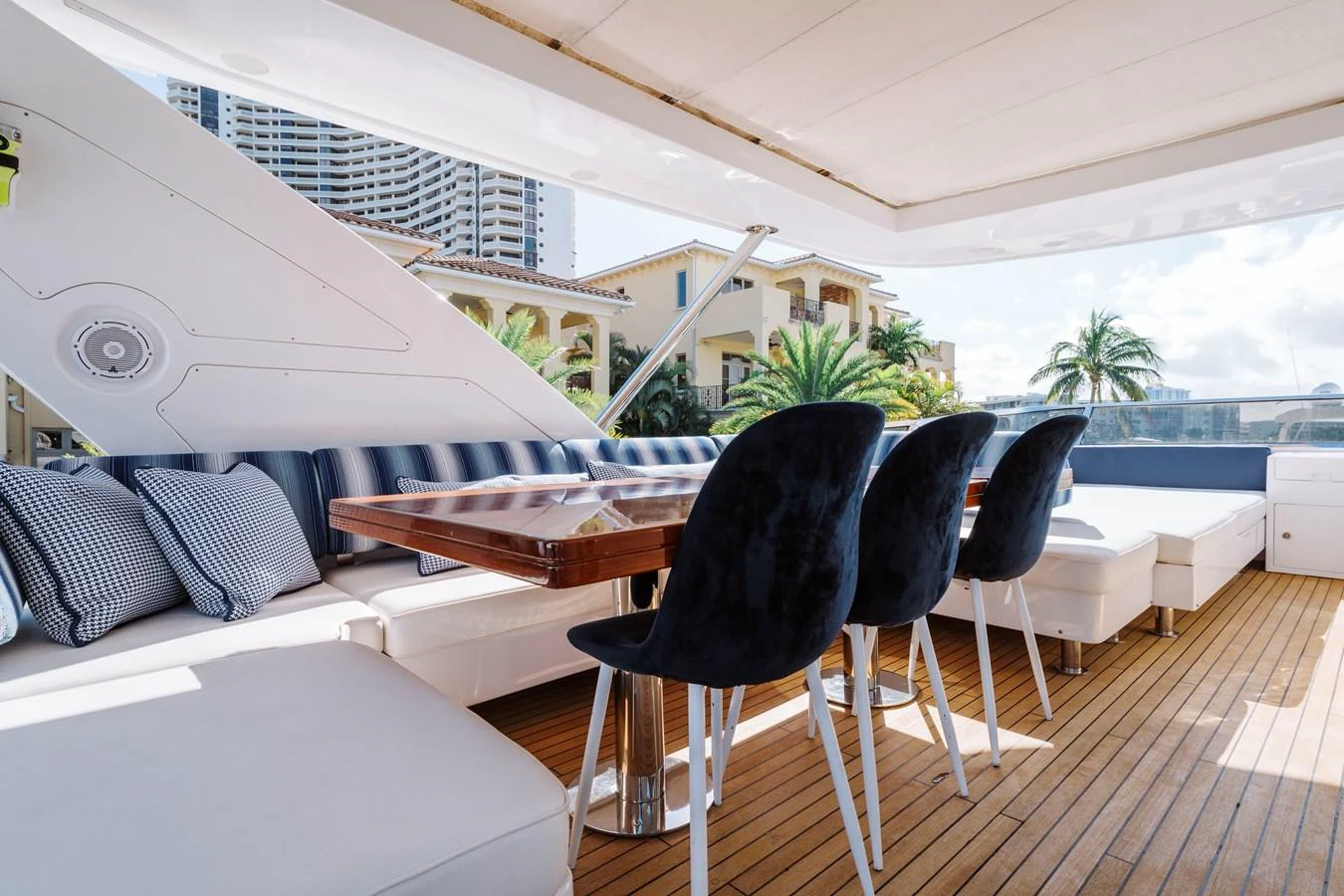 a room with a table and chairs aboard RESET Yacht for Sale