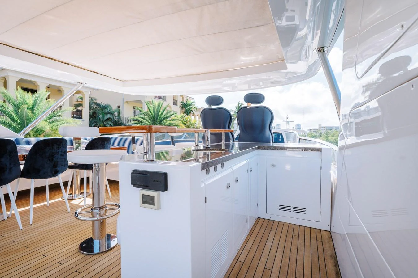 a room with a desk and chairs aboard RESET Yacht for Sale