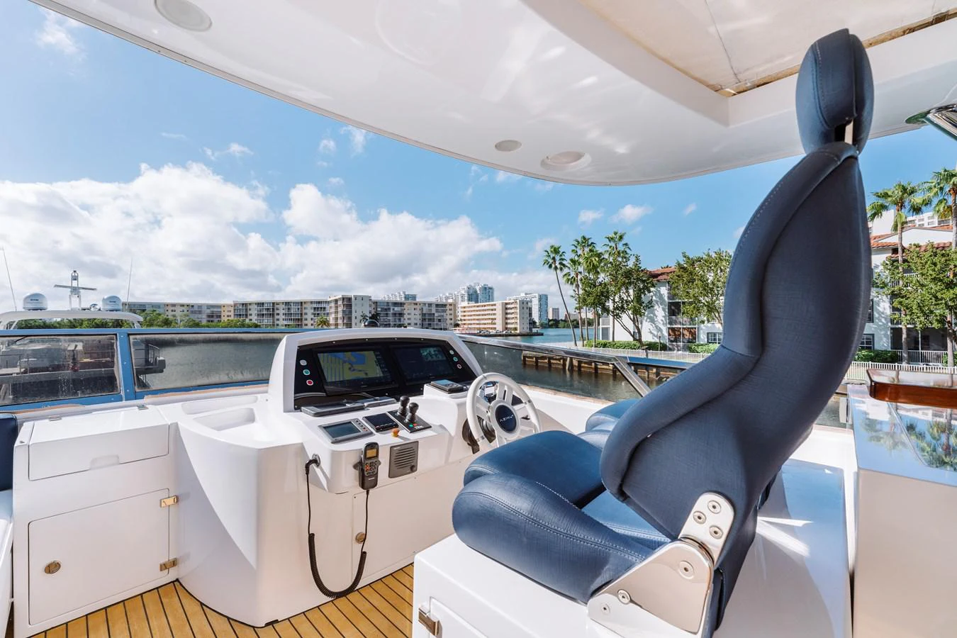 a person sitting in a car aboard RESET Yacht for Sale