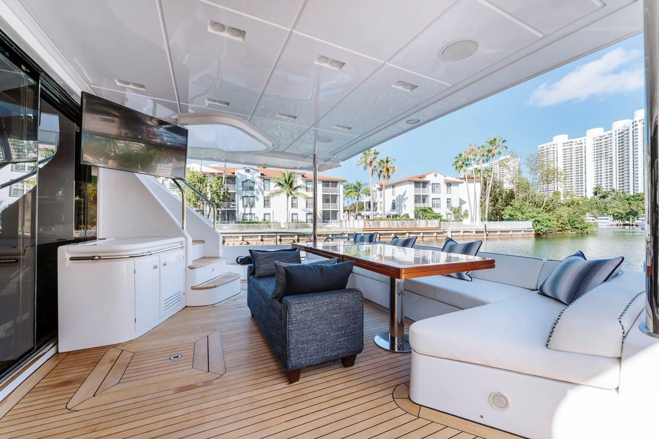 a living room with a large open window aboard RESET Yacht for Sale
