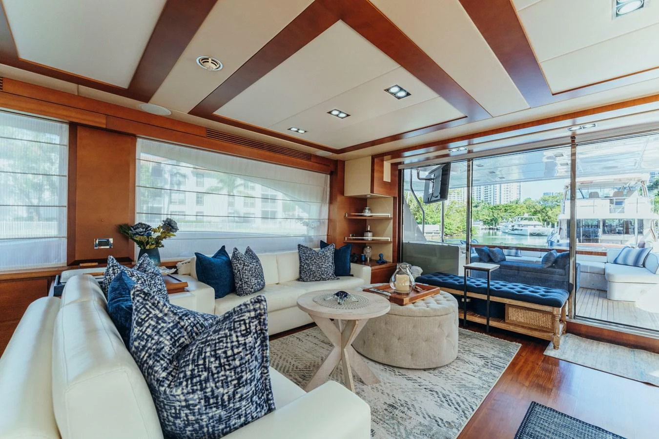 a living room with a large window aboard RESET Yacht for Sale