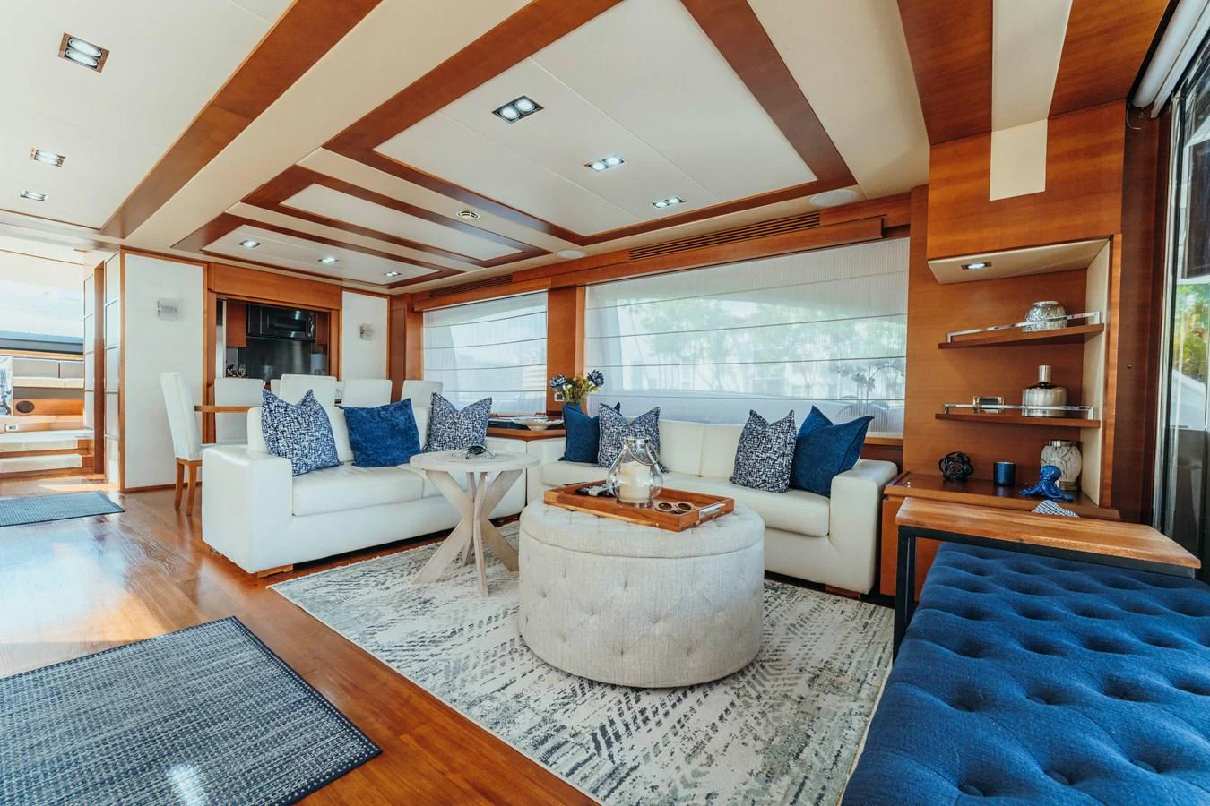 a living room with a large open window aboard RESET Yacht for Sale