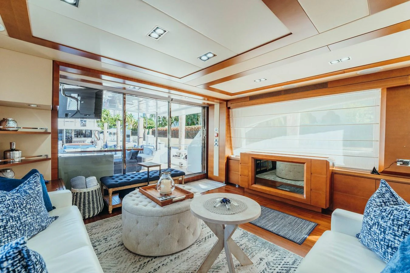 a living room with a large window aboard RESET Yacht for Sale