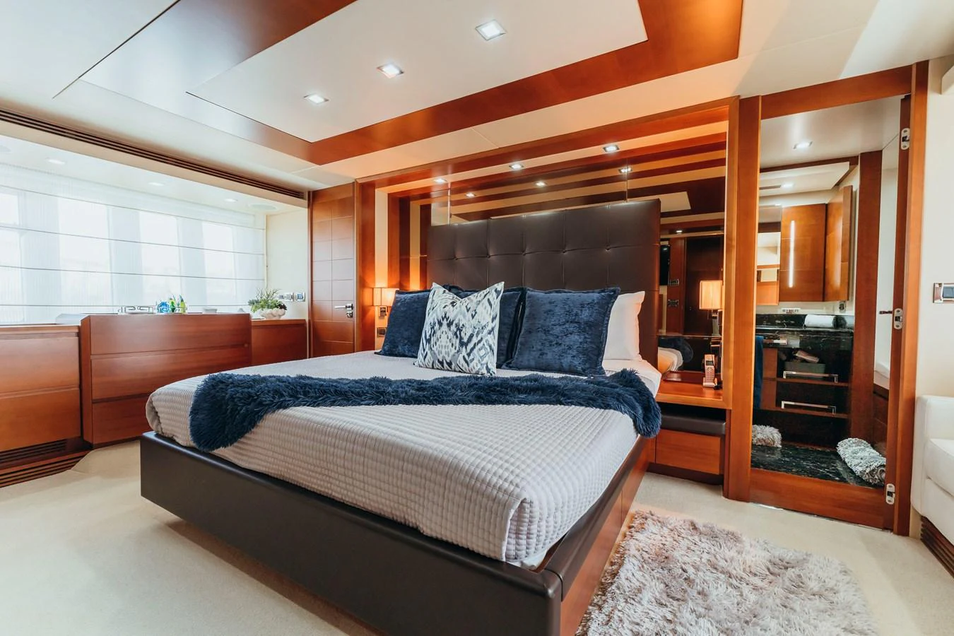 a bed in a room aboard RESET Yacht for Sale