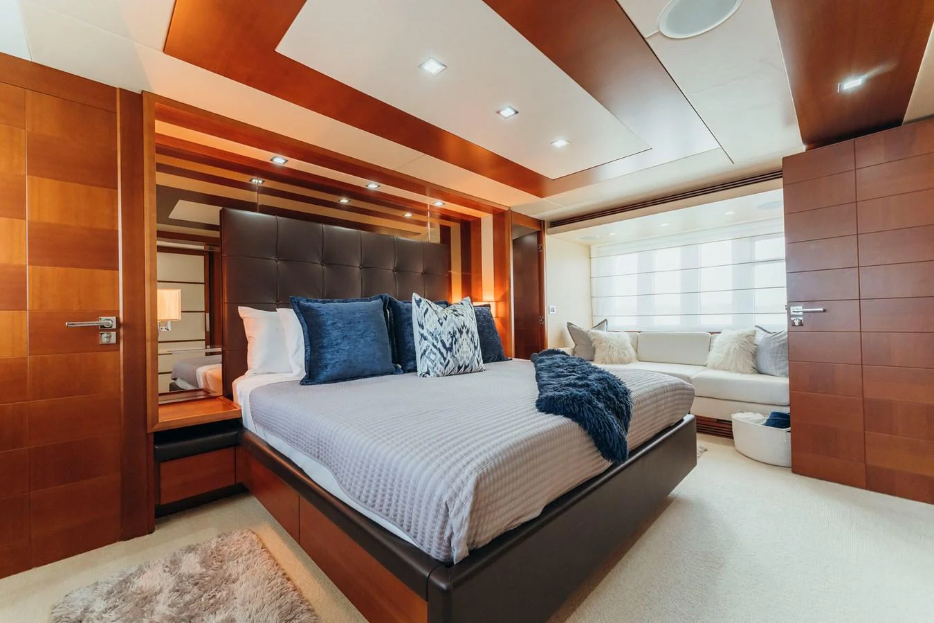 a bed in a room aboard RESET Yacht for Sale