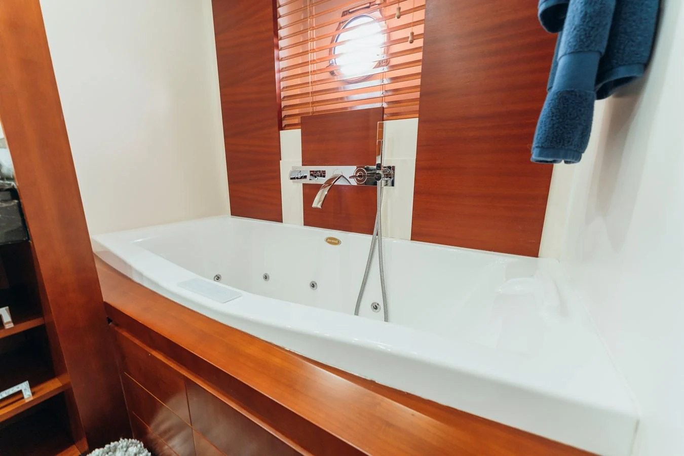 a bathtub with a guitar in it aboard RESET Yacht for Sale