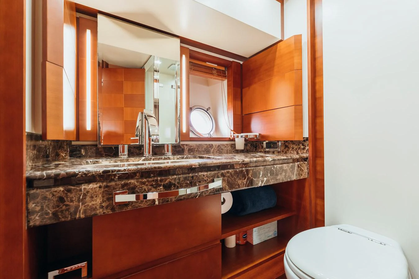 a bathroom with a large mirror aboard RESET Yacht for Sale