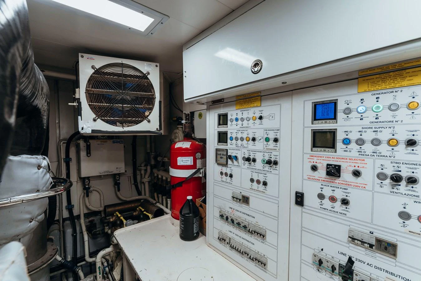 a machine with a red and white logo aboard RESET Yacht for Sale