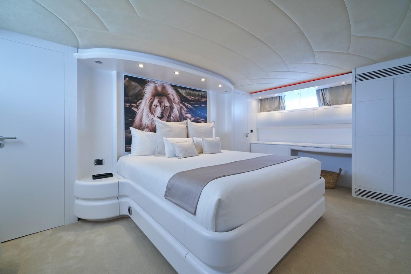 a room with a bed and a window aboard KIAWAH II Yacht for Charter