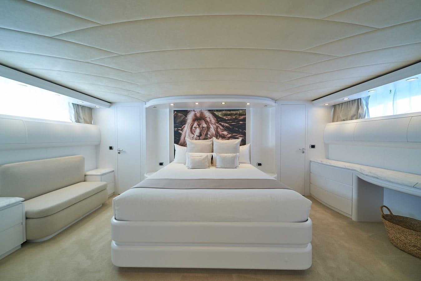 a white couch in a room aboard KIAWAH II Yacht for Charter