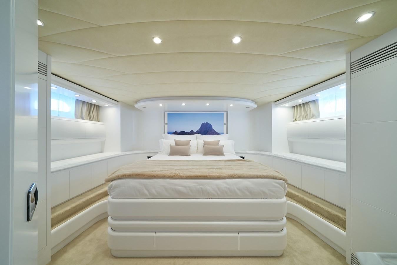 a bed in a room aboard KIAWAH II Yacht for Sale