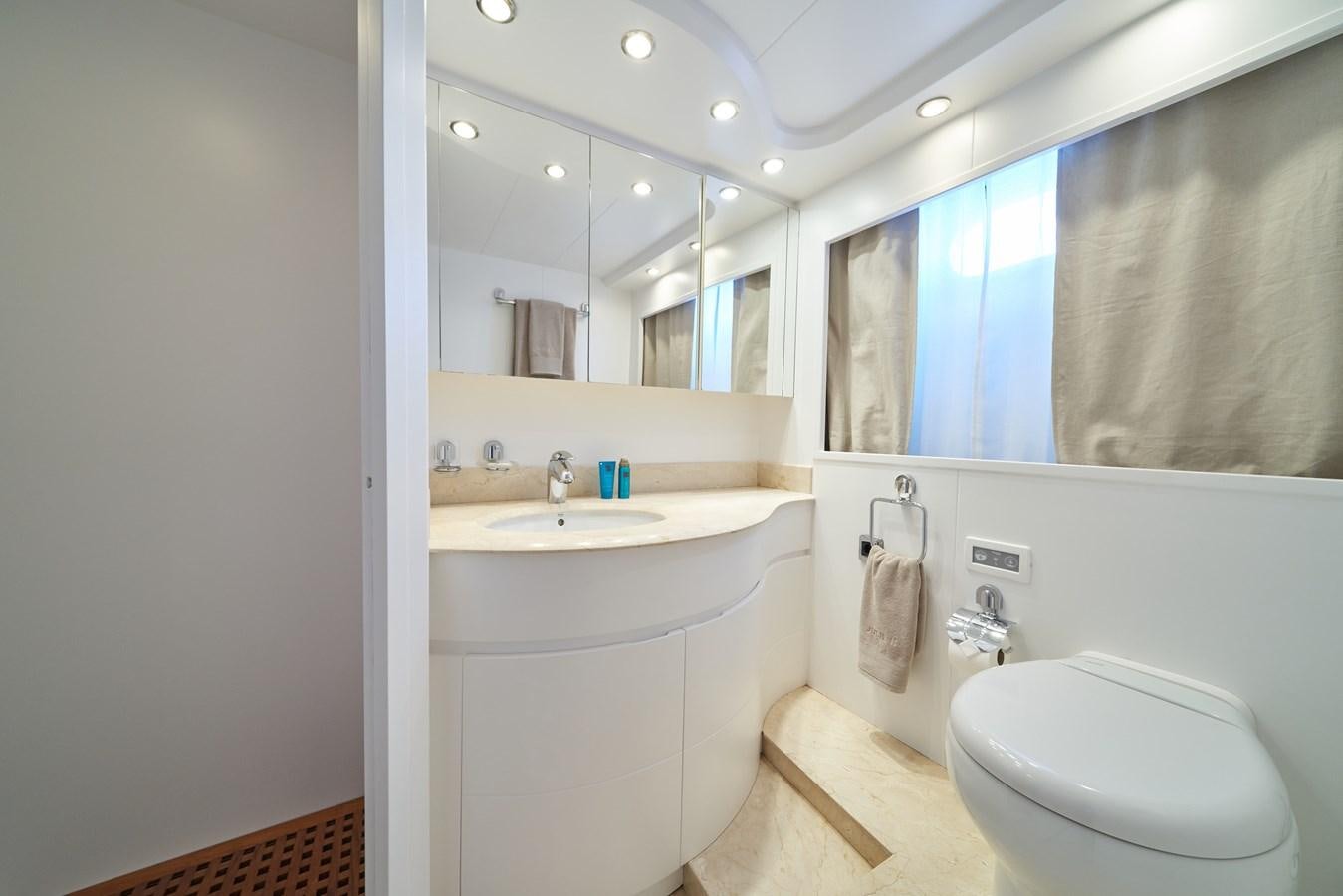 a bathroom with a sink and a toilet aboard KIAWAH II Yacht for Charter