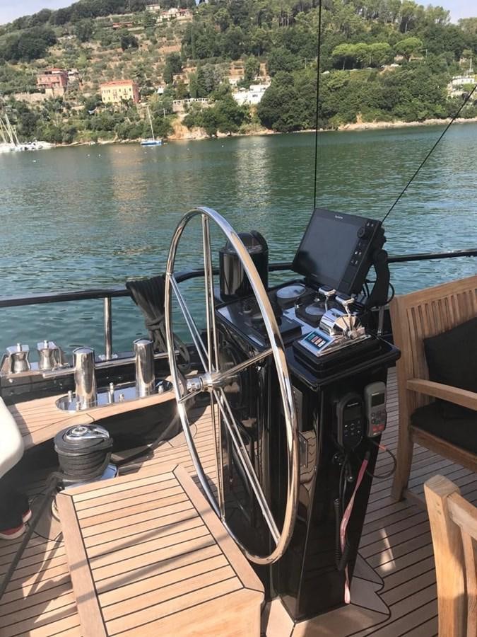 a boat on the water aboard BLACKWOOD I Yacht for Sale
