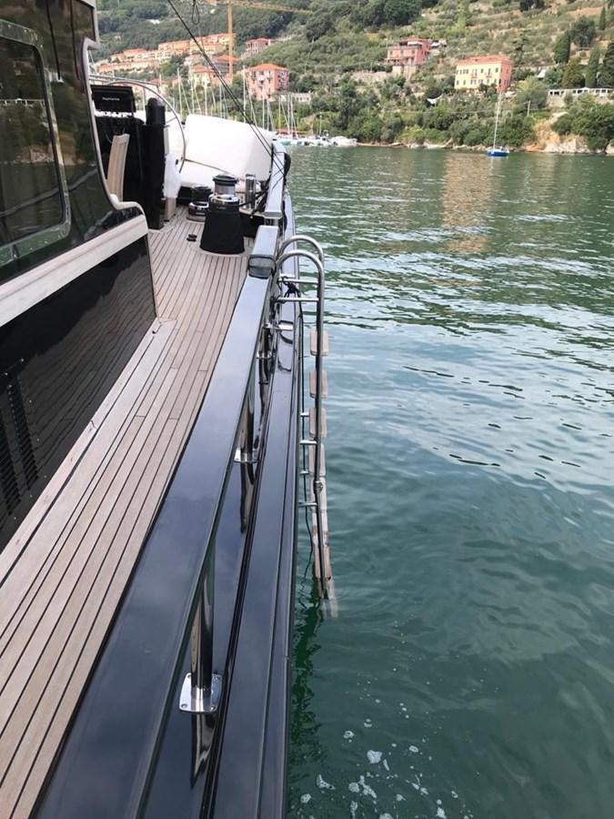 a boat on the water aboard BLACKWOOD I Yacht for Sale