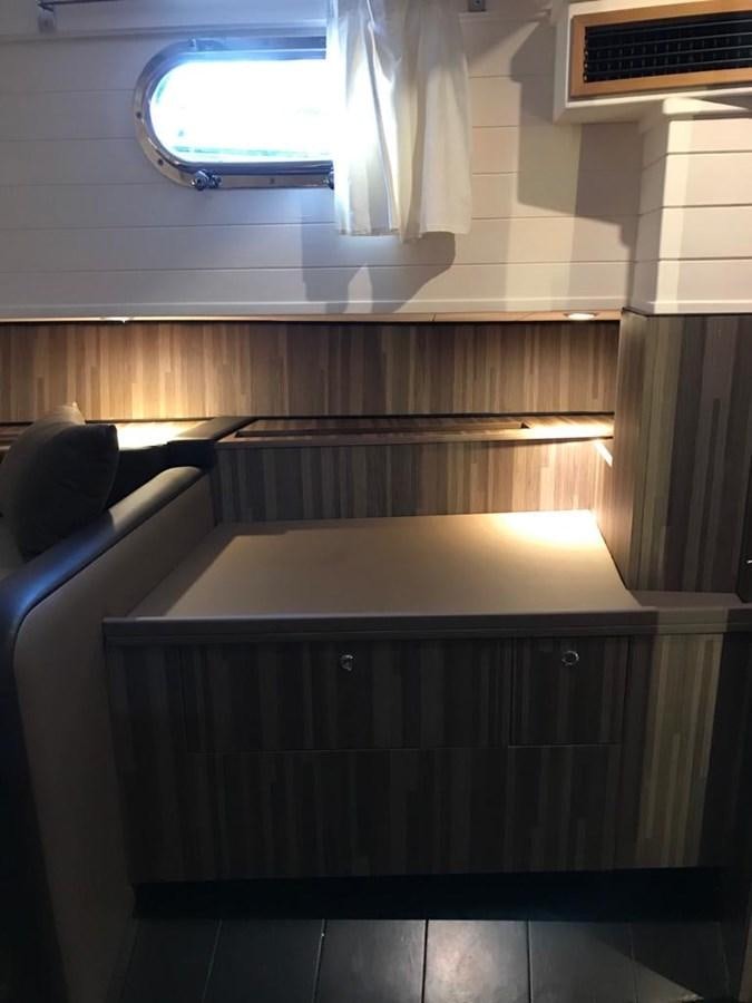a room with a window and a desk aboard BLACKWOOD I Yacht for Sale