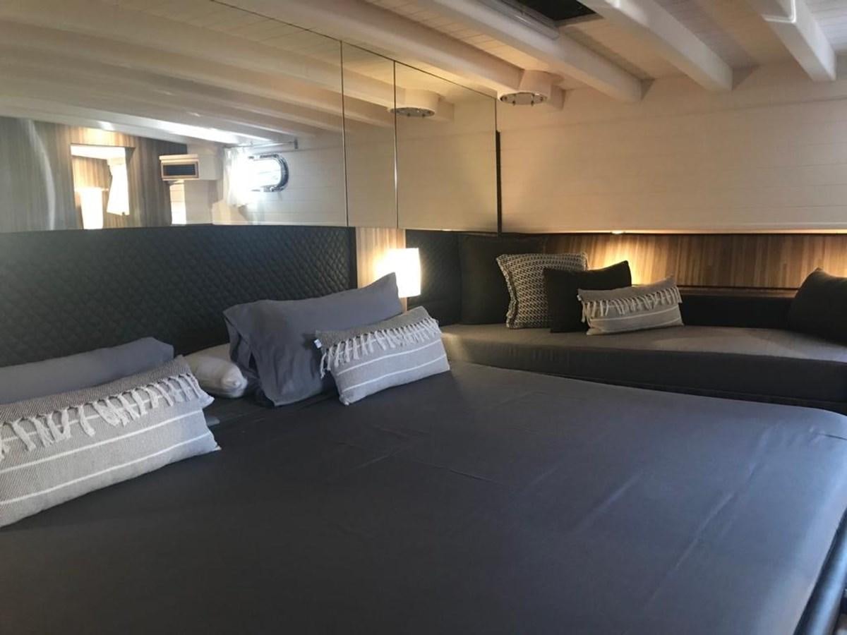 a large bed with pillows aboard BLACKWOOD I Yacht for Sale