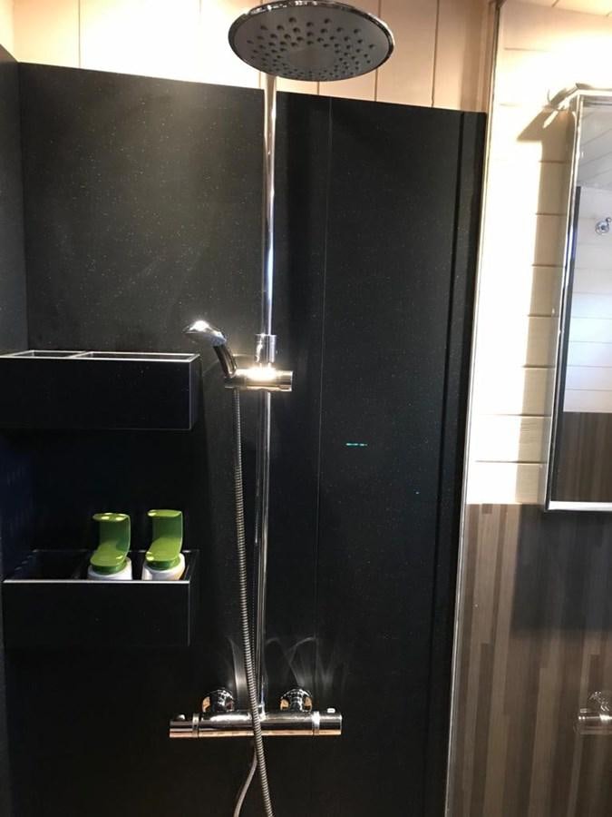 a shower unit with a mirror aboard BLACKWOOD I Yacht for Sale