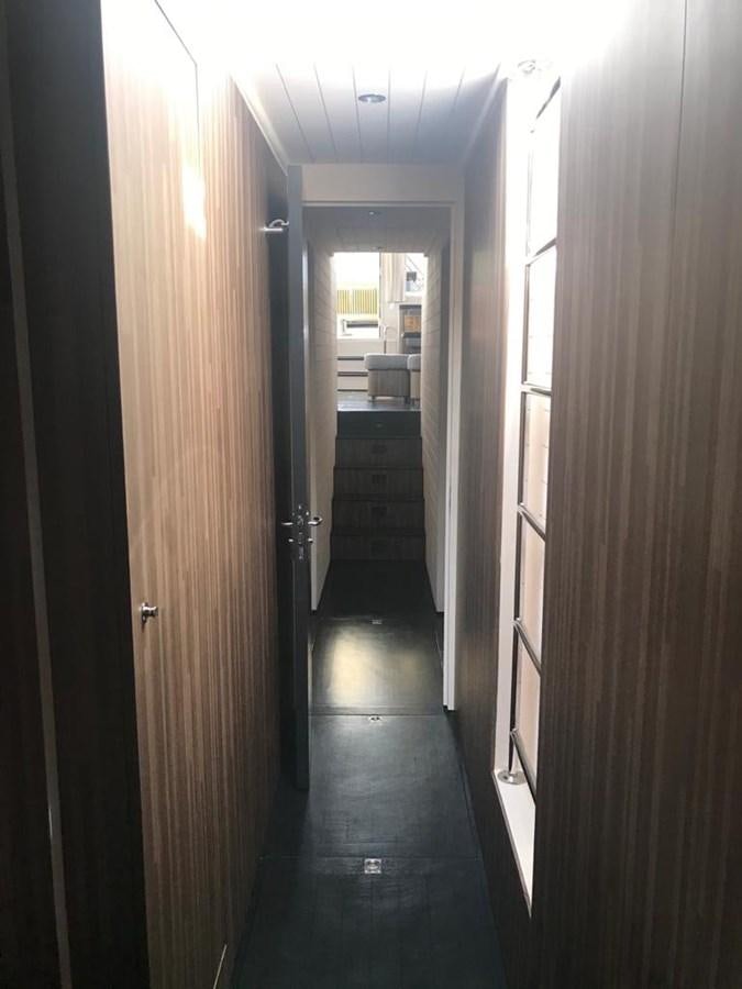 a hallway with doors aboard BLACKWOOD I Yacht for Sale
