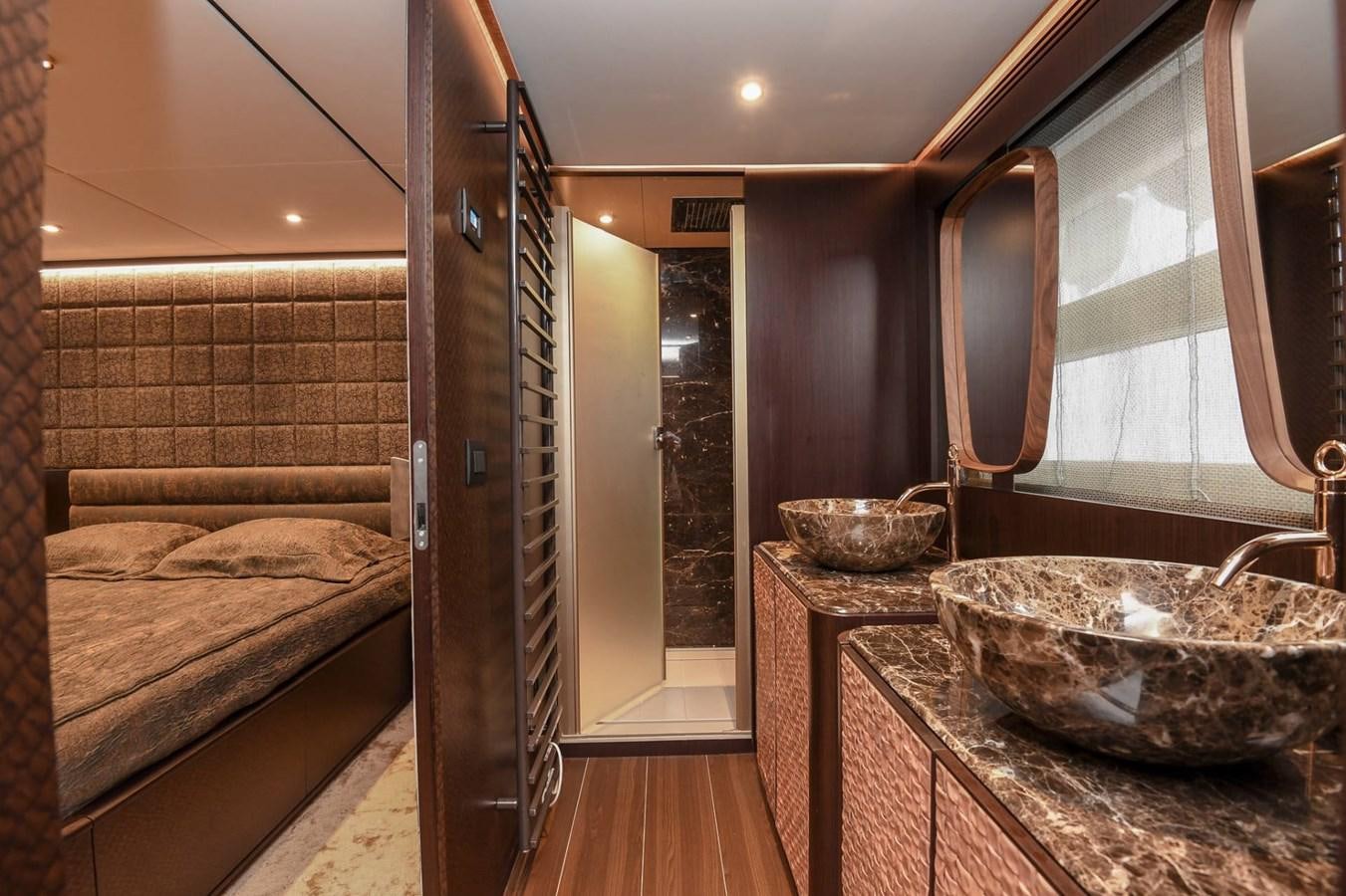 a bathroom with a sink and a mirror aboard CECILOU Yacht for Sale