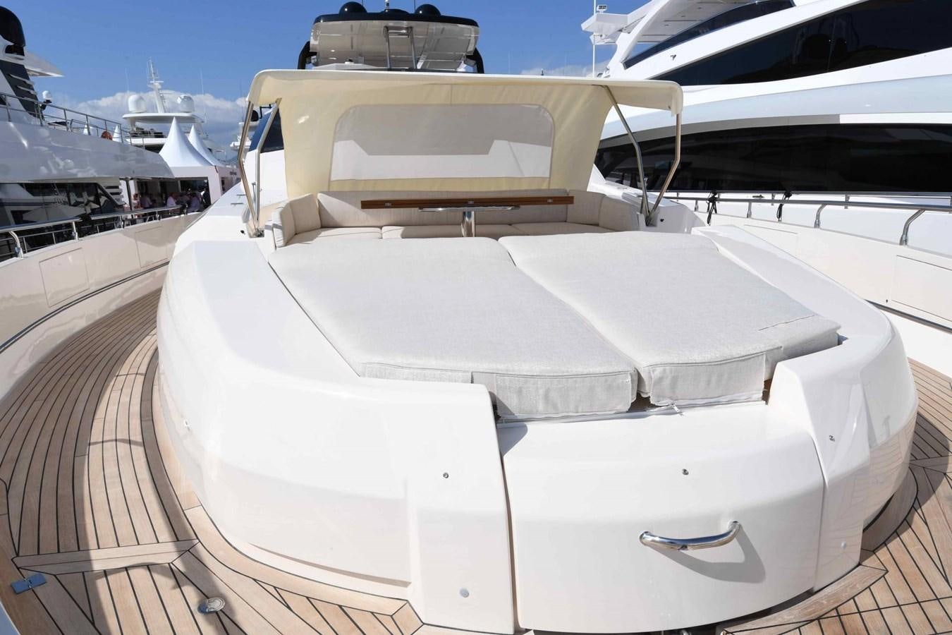 a white boat on a dock aboard CECILOU Yacht for Sale