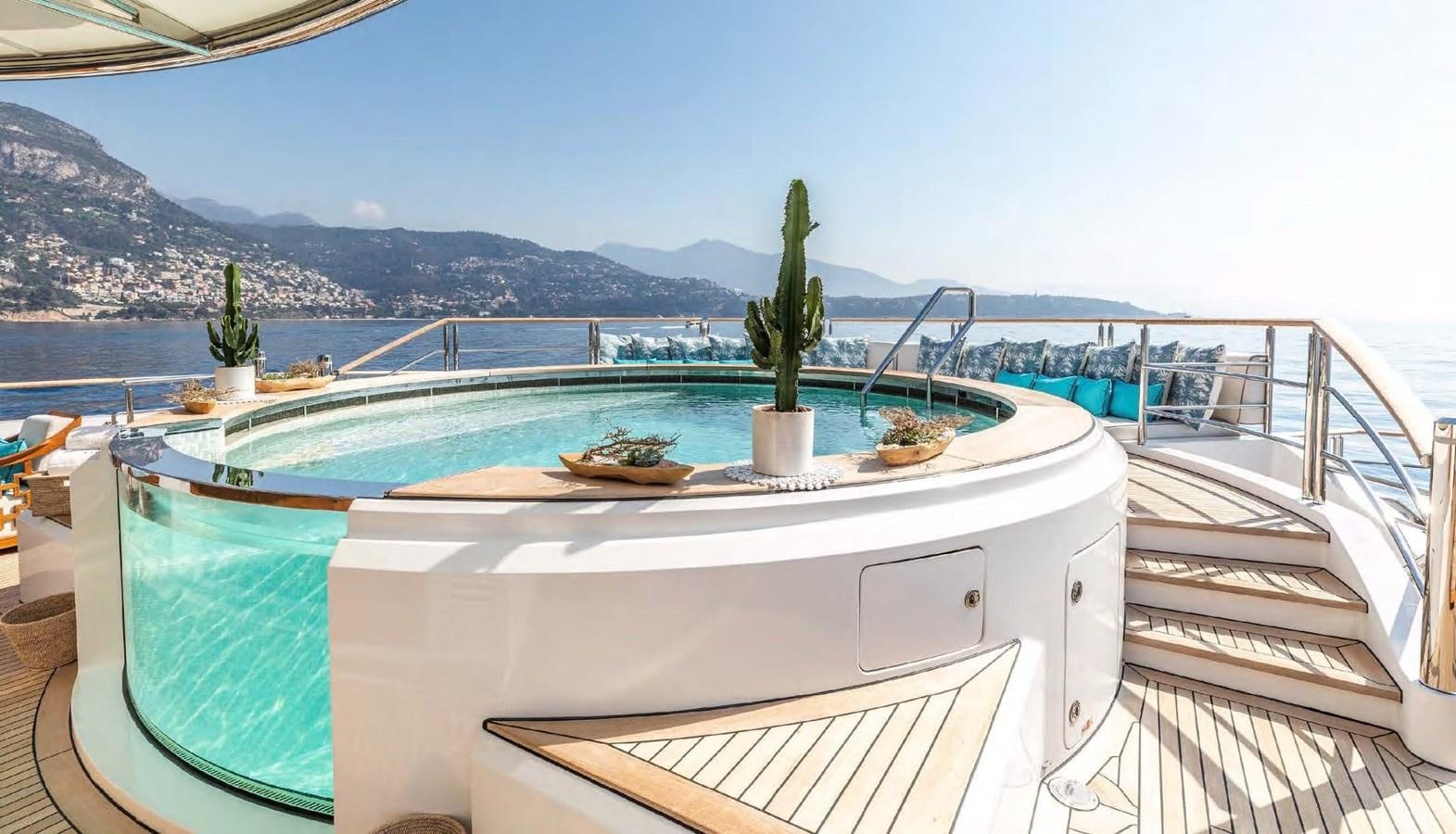 a swimming pool on a deck aboard SAMSARA Yacht for Charter