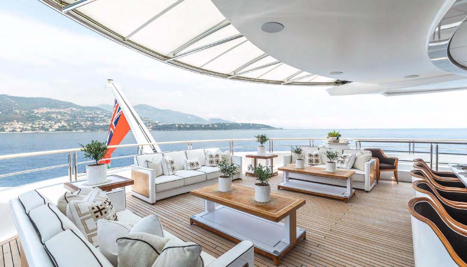 a room with a table and chairs aboard SAMSARA Yacht for Charter