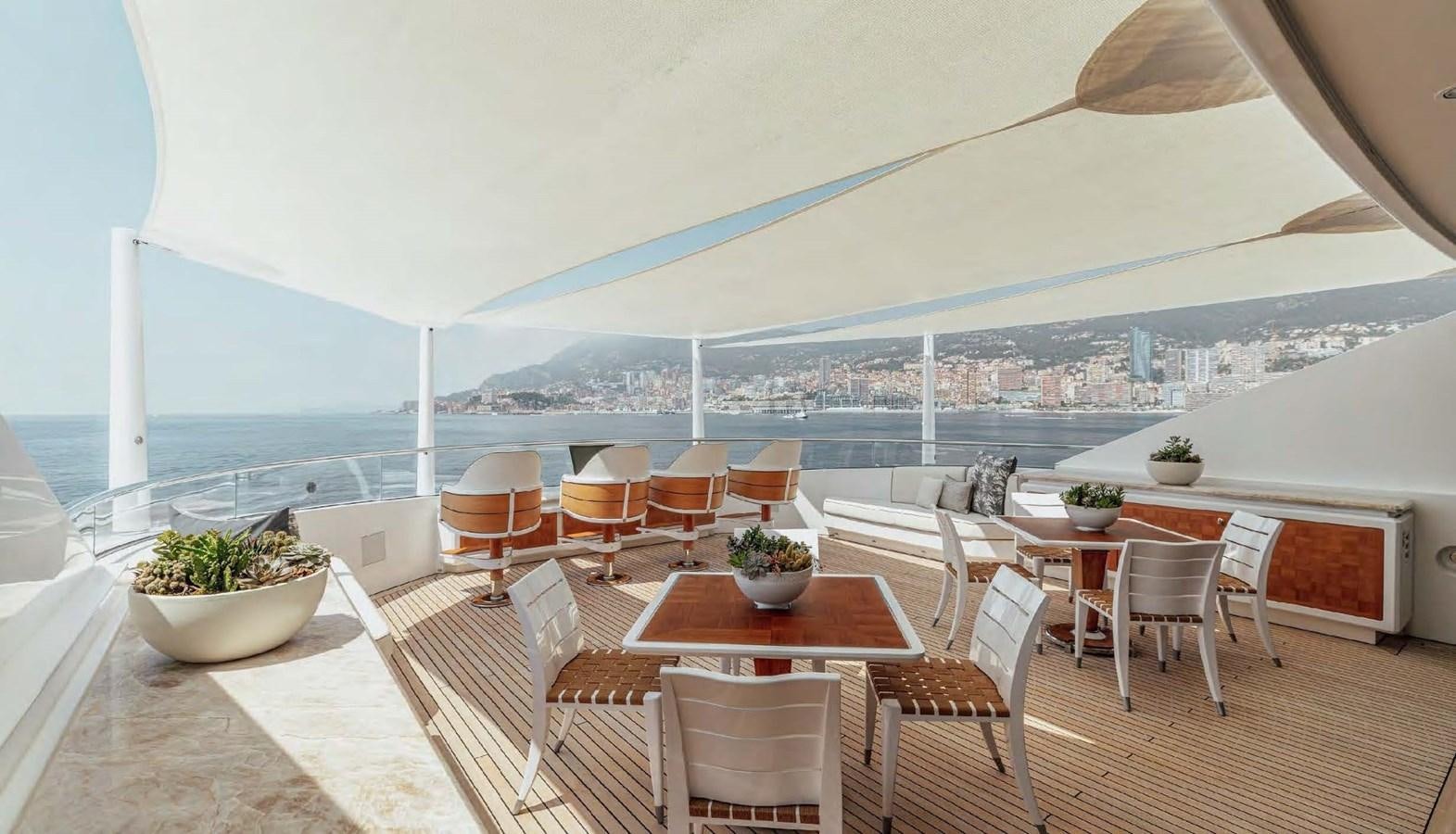 a room with a table and chairs aboard SAMSARA Yacht for Charter