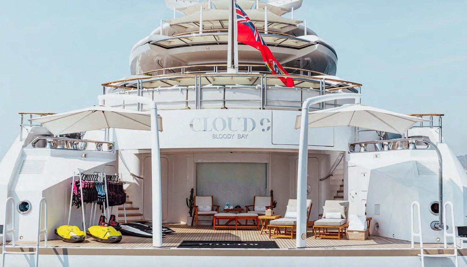a large white boat with a ladder aboard SAMSARA Yacht for Charter