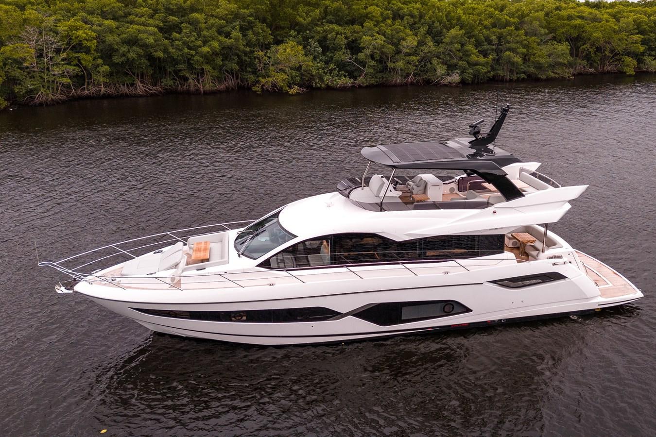 a white yacht in the water aboard MANHATTAN 68 Yacht for Sale