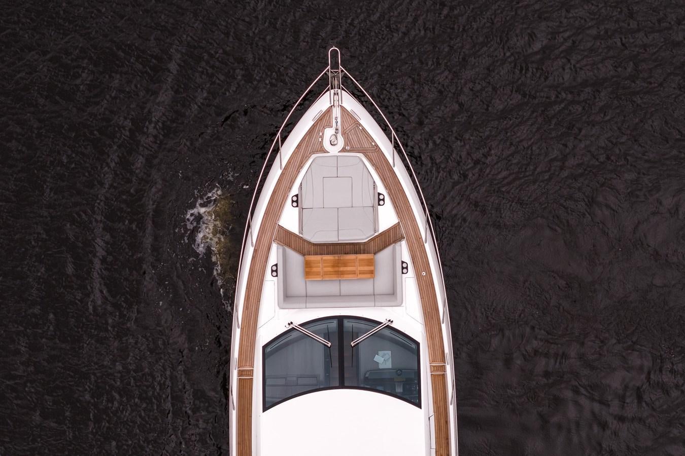 a tall tower with a clock aboard MANHATTAN 68 Yacht for Sale