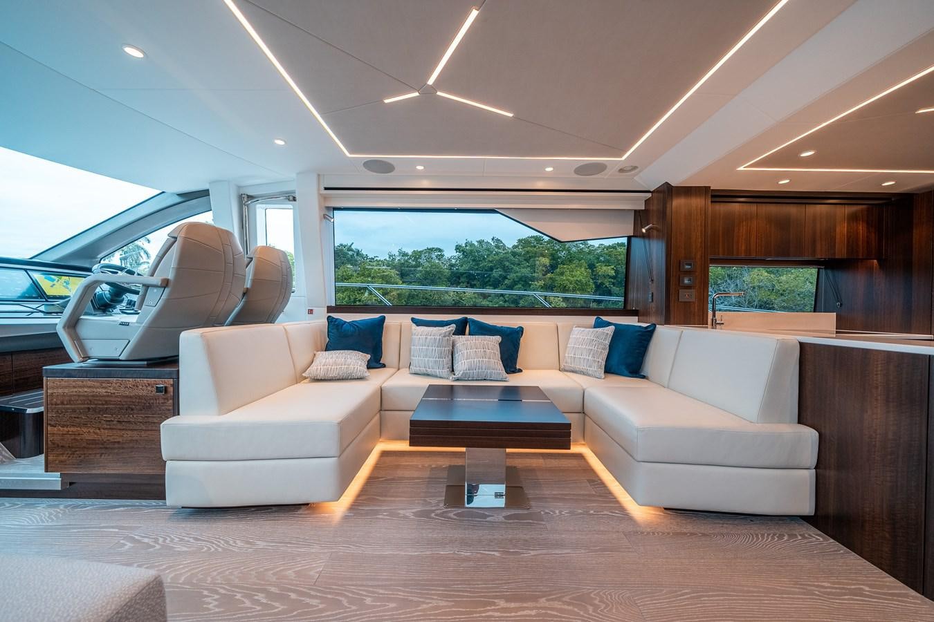 a living room with a couch and a table aboard MANHATTAN 68 Yacht for Sale