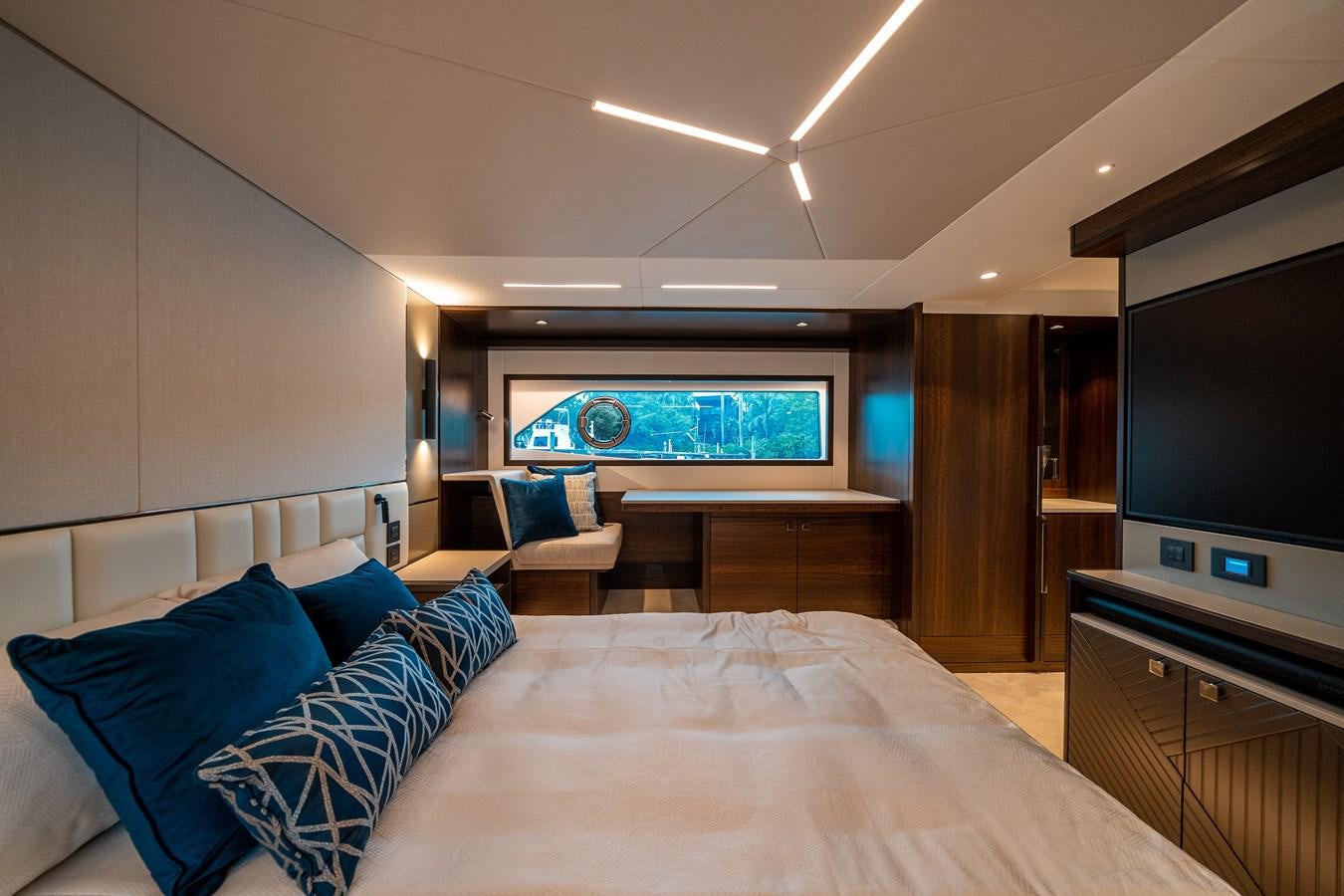 a hotel room with a large bed aboard MANHATTAN 68 Yacht for Sale