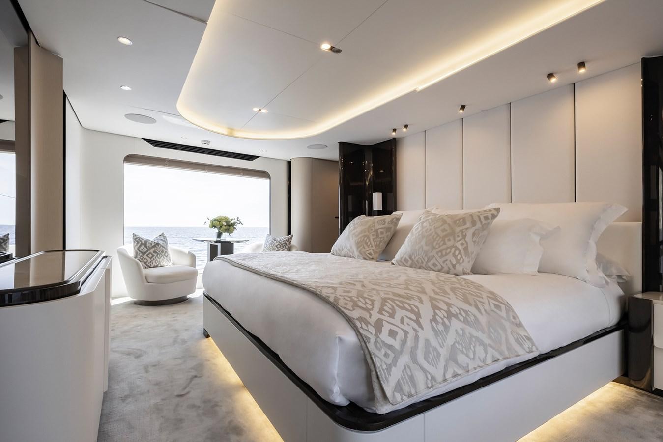 a large bed in a room aboard AZIMUT GRANDE 32M  Yacht for Sale