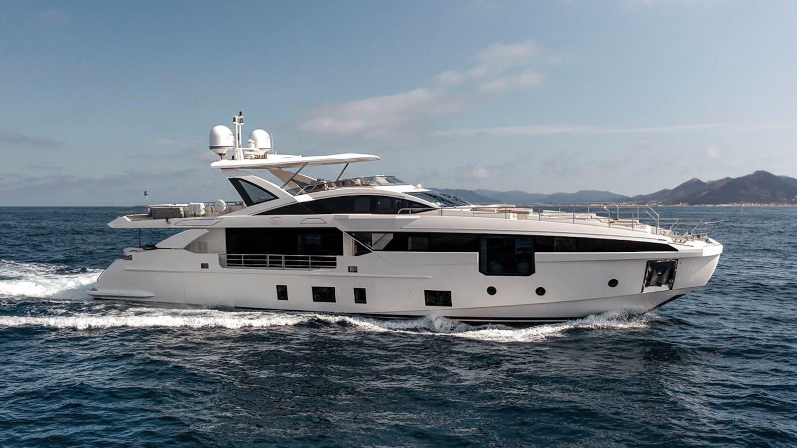 a white yacht on the water aboard AZIMUT GRANDE 32M  Yacht for Sale