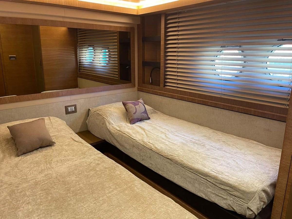 a bed with a pillow aboard SKYFALL Yacht for Sale