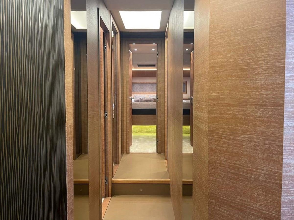 a hallway with doors aboard SKYFALL Yacht for Sale