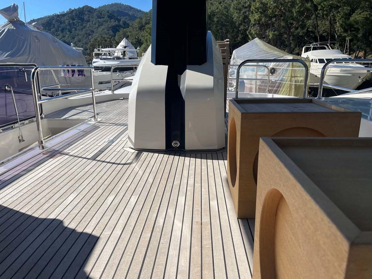 a deck with a deck and a grill on it aboard SKYFALL Yacht for Sale