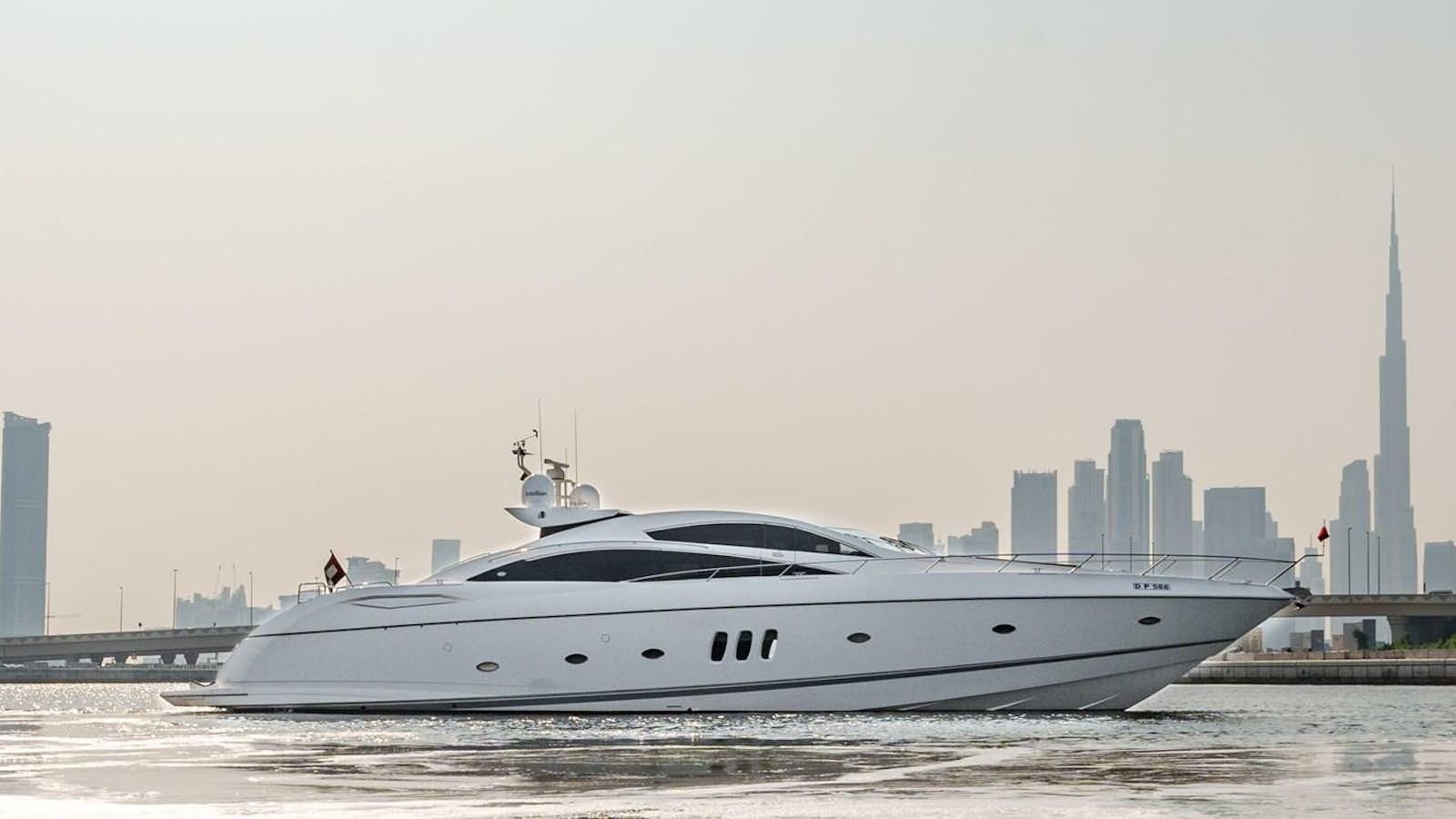 a white yacht on the water aboard MILA DUBAI Yacht for Sale