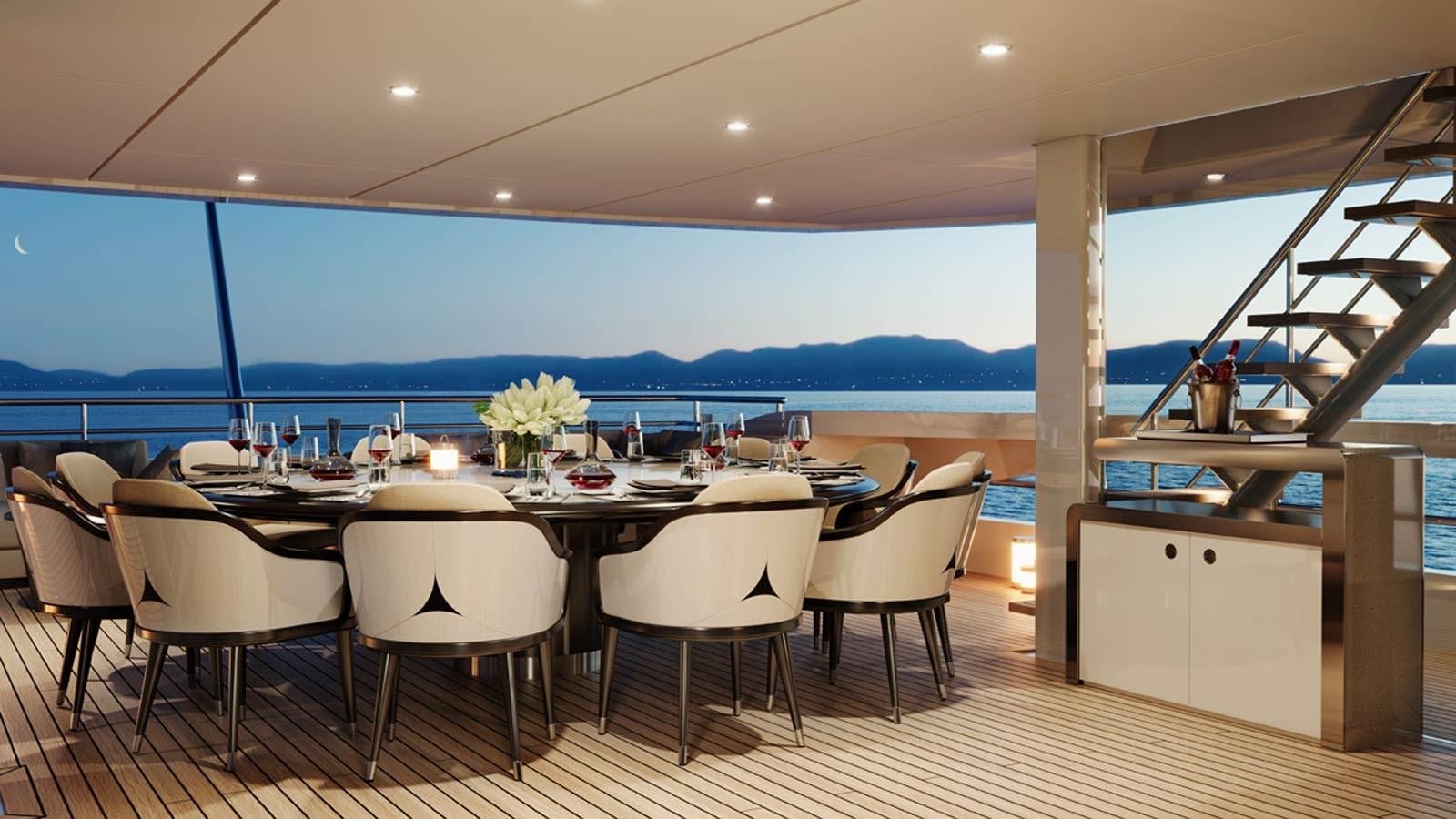 a room with a table and chairs aboard ALP Yacht for Sale