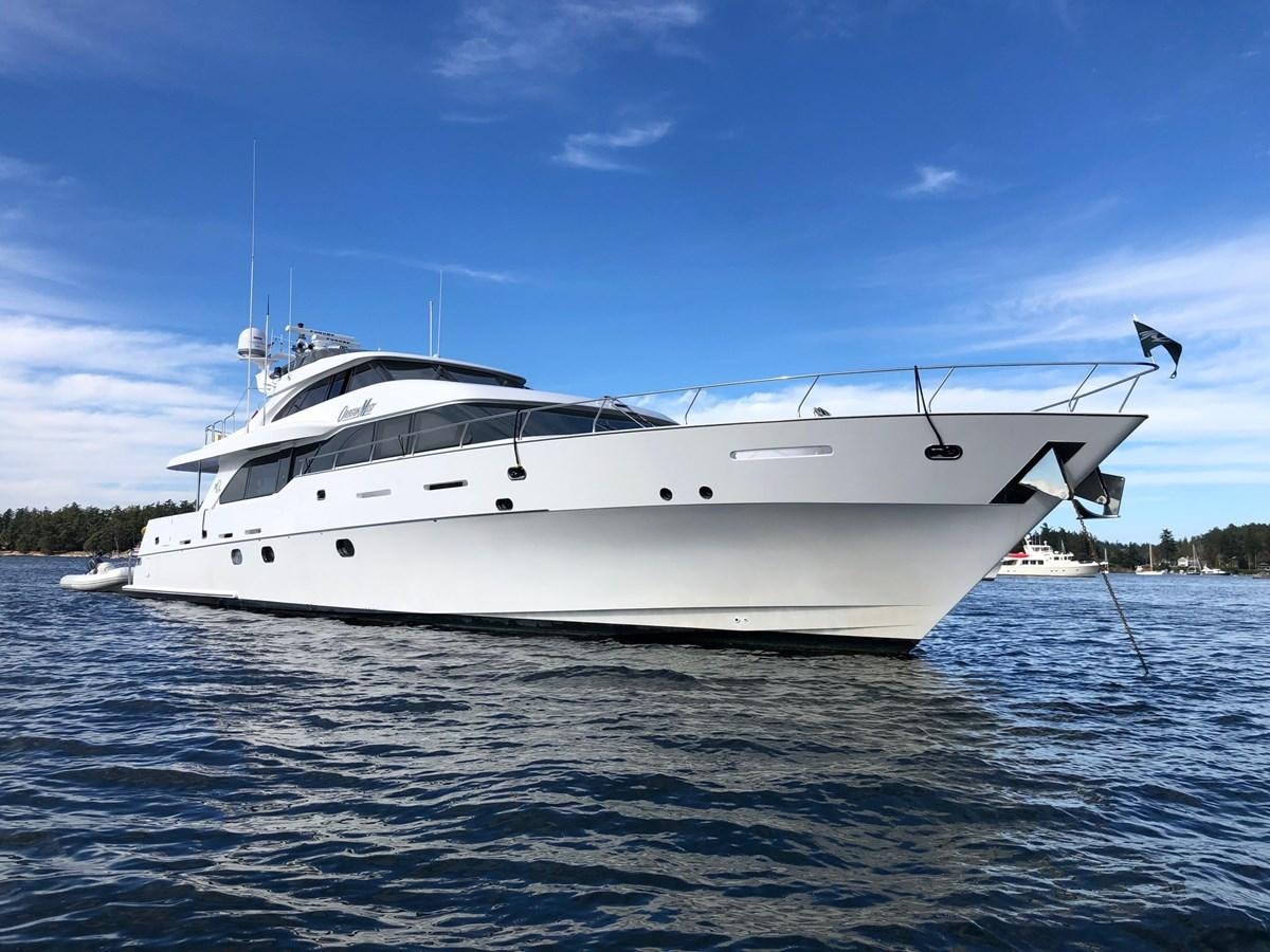 a white yacht on the water aboard OREGON MIST Yacht for Sale