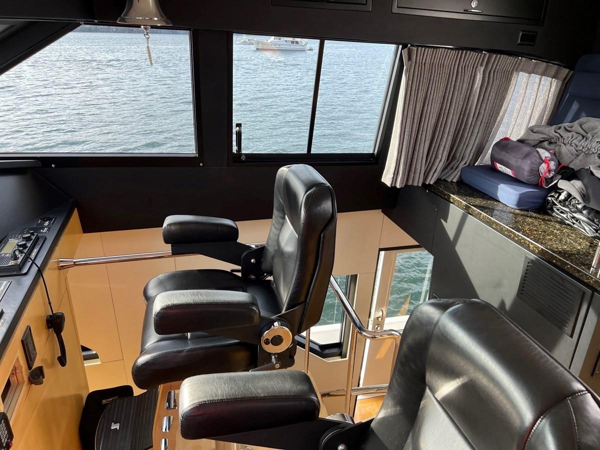 a room with a desk and a chair aboard OREGON MIST Yacht for Sale