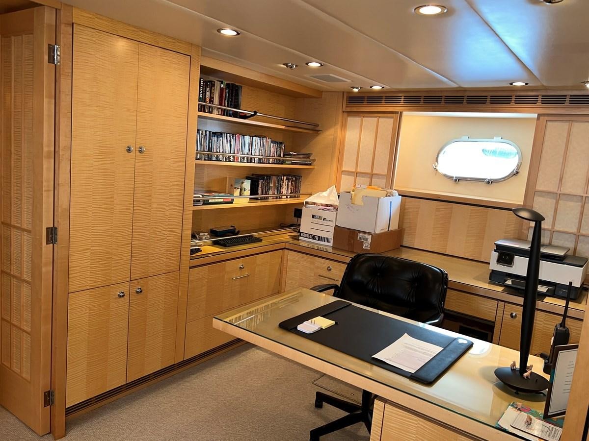 a room with a desk and a chair aboard OREGON MIST Yacht for Sale