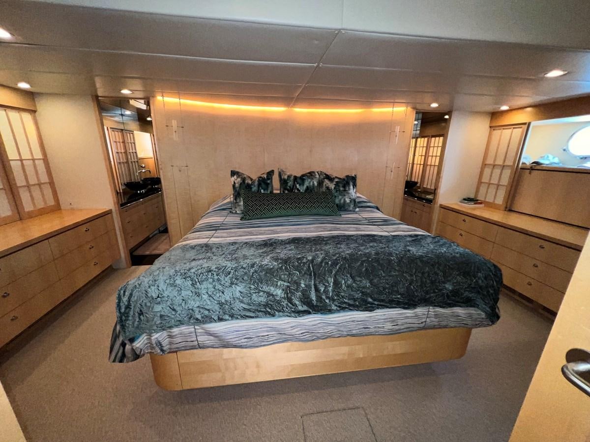 a large bed in a room aboard OREGON MIST Yacht for Sale