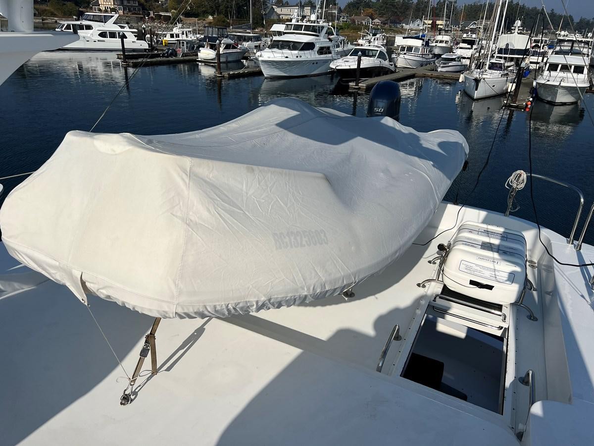 a boat docked at a pier aboard OREGON MIST Yacht for Sale