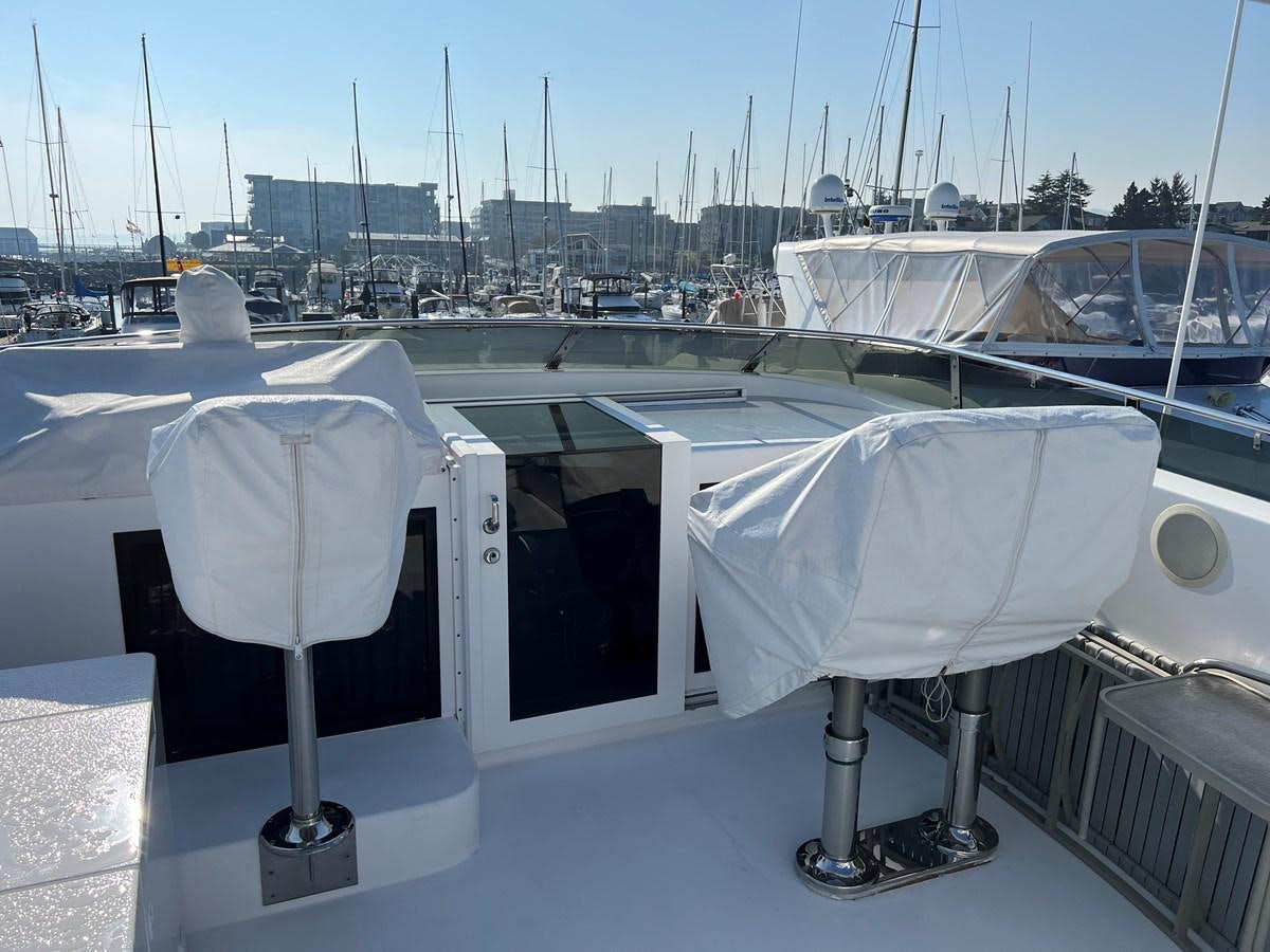 a white table on a boat aboard OREGON MIST Yacht for Sale