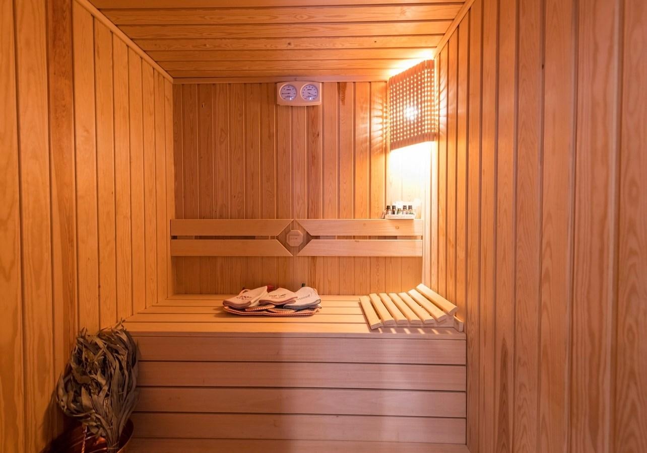 a wooden room with a shelf and a window aboard SERENITY II Yacht for Sale