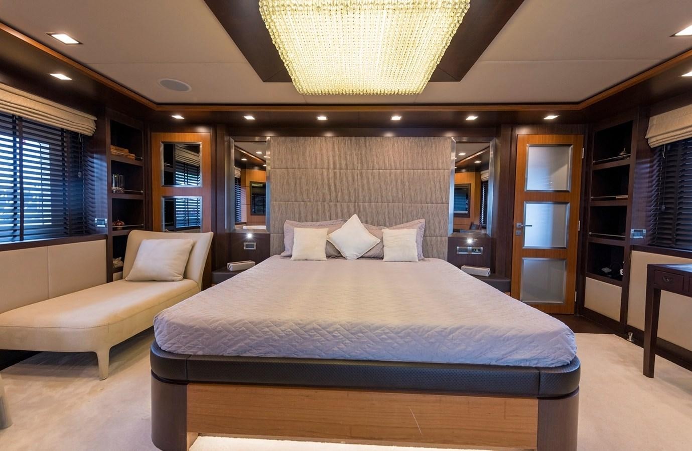 a large bed in a room aboard SERENITY II Yacht for Sale