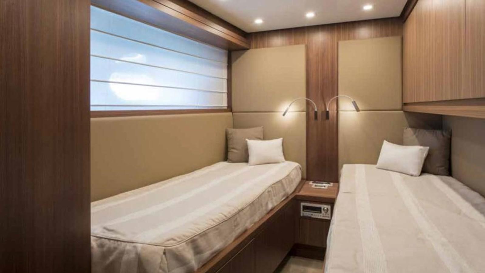 a room with two beds aboard MARIS STELLA Yacht for Sale